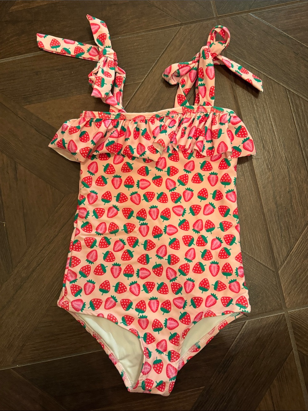 Girls Pink Strawberry One-Piece Swimsuit with Ruffle & Tie Straps